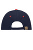 A navy blue 6 panel sandwich cap featuring a red button and eyelets, with an adjustable strap at the back.