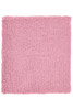 A pink terry wristband featuring a textured, soft fabric, suitable for headwear accessories. It has a logo.