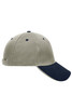 A beige and navy 5 panel sandwich cap featuring a contrasting peak and an adjustable strap at the back.