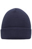 A knitted beanie in navy blue featuring a ribbed texture and a rolled cuff, with a logo on the side.