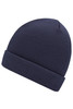 A knitted beanie in a dark navy colour, featuring a ribbed texture and a fold-up cuff. It has a logo on it.