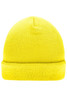 A knitted beanie in bright yellow, with a folded cuff and textured fabric. Features a logo.