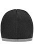 A beanie with a black body and a grey contrast edge, featuring a circular top. It has a logo on it.
