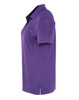 A women's purple pique polo shirt with short sleeves and a collar, featuring a logo on the front.