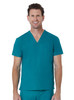 A unisex v-neck top in teal, featuring a pocket and a branding logo. The model is smiling and standing upright.