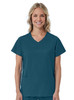 A teal women's mock wrap top with short sleeves and two front pockets, featuring a logo.