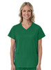A green women's mock wrap top with short sleeves and front pockets, featuring a logo on the left side.