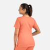 An orange women's double V-neck top, featuring short sleeves and a fitted silhouette, with a visible logo.