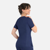 A navy women's curved mock wrap top with short sleeves and a side pocket, featuring a branding logo.