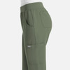A pair of women's joggers in olive green, featuring pockets and an elastic waistband. The design includes a logo.