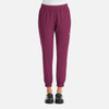 A pair of women's joggers in a vibrant burgundy colour with an elastic waistband and pockets, featuring a logo.