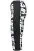 Ladies' 3/4 tights featuring a black and white abstract pattern with a solid black side panel. Includes branding.