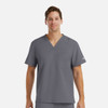 A men's tuckable V-neck top in grey, featuring a front pocket and a logo on the sleeve.