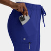 A pair of women's cargo pants in navy blue with a full elastic waistband and multiple pockets.