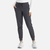 A pair of women's jogger-style pants in a dark grey colour, featuring a drawstring waist and side pockets.