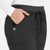 A pair of black women's cargo pants featuring a contrast waistband and pockets, with a small logo.