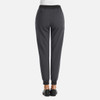 A pair of women's joggers in grey with a fitted waist and metallic detail, featuring side pockets and elastic cuffs.