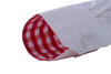 A white button-up shirt featuring a red checked pattern on the cuff. The shirt includes a button detail.