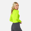 A vibrant green long-sleeve women's underscrub tee with a fitted design, displayed from the back.