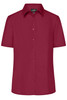 A short-sleeved ladies' business shirt in a rich burgundy colour with a button-up front and collar.