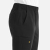 A pair of black jogger pants featuring a full elastic waistband and side pockets, with a small logo.