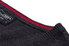 A close-up of a dark grey knitted men's V-neck vest with a red striped neckline and a label visible.