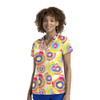 A women's V-neck top featuring a vibrant tie-dye pattern with bright colours including pink, yellow, and blue.