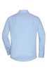 A light blue button-up shirt with long sleeves and a collar, featuring a logo on the back.