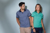 A heather blue polo shirt worn by a man and a mint green polo shirt worn by a woman, both featuring a logo.