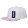 A white snapback cap featuring a pink bandanna patterned brim and a logo tag on the front.