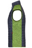 A knitted hybrid vest featuring a green and navy design, with large armholes and a zippered collar.