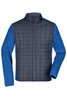 A knitted hybrid jacket featuring a navy quilted body and blue sleeves, complemented by a zipper closure.