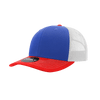 A structured trucker cap featuring a blue front, red brim, and a white mesh back. It has a logo on the side.