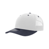 A structured trucker cap in white with a navy peak and mesh back, featuring a logo on the front.