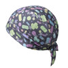 A patterned bandana in grey featuring colourful shapes including stars, bottles, and circles, tied at the back.