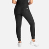 A pair of black mid-rise joggers with a tapered fit and a side pocket, worn with white sneakers.