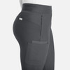 A mid-rise jogger in dark grey with pockets and a fitted silhouette. The design features a logo.