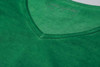A green ladies' t-shirt features a v-neck design and a smooth fabric texture. It has a logo at the neckline.