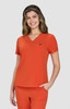 An orange V-neck top with short sleeves, featuring a logo, modelled by a smiling woman.