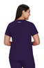 A purple short-sleeve top is displayed on a woman, showing the back view. The top features a logo.
