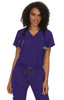 A woman wears a purple v-neck top with a stethoscope around her neck, featuring a logo.