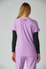 A top in light purple with a sleek design, featuring a back view and a small logo.