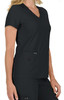 A black women's top featuring a V-neck, short sleeves, and two front pockets. Includes a logo tag.