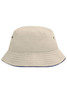 A beige bucket hat with a wide brim and small ventilation holes, featuring a contrasting navy edge.