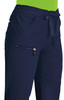 Navy blue pants with pockets and a drawstring waist; features a logo.