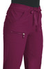 A pair of burgundy pants with pockets and a drawstring waist, featuring a zippered pocket.