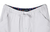 A pair of white pants featuring an elastic waistband with a patterned inner lining and a drawstring.