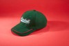 A green cap with a curved peak and a logo, featuring red accents on the brim.