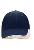 A navy blue cap with a beige peak and a logo on the front.