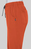 Cotton jogger pants in a vibrant orange colour with an elastic waistband and side pocket. Features a logo.